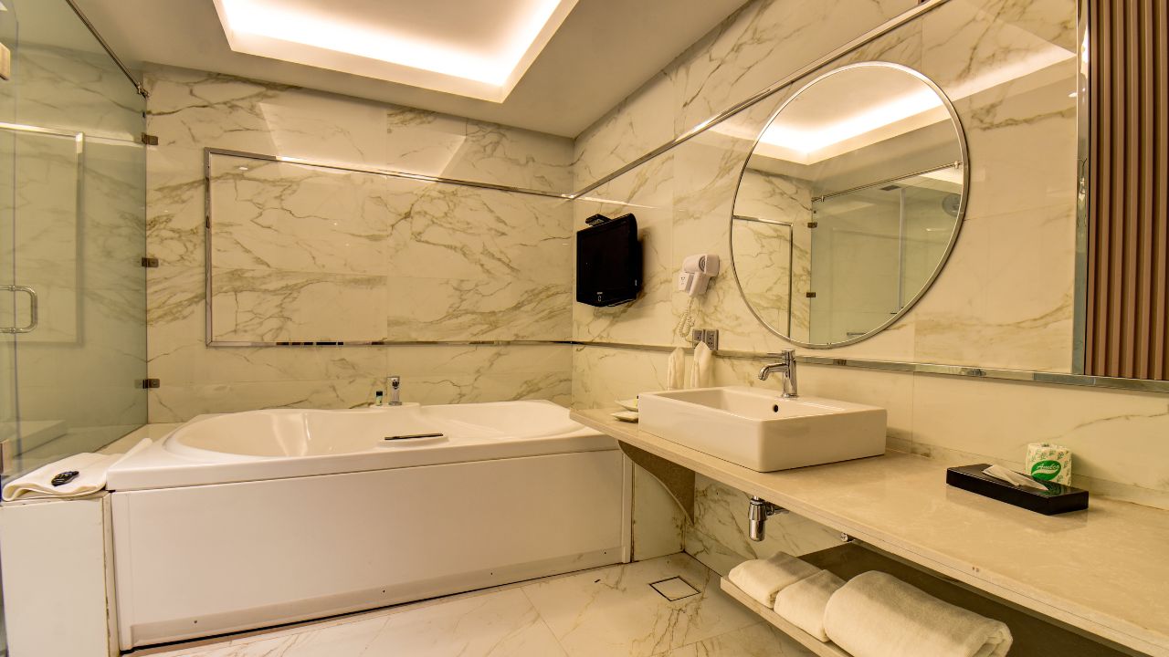 A Grand Suite hotel room in Pune at Corinthians Pune Resort & Club