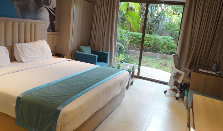 A spacious hotel room in Pune at Corinthians Pune Resort & Club